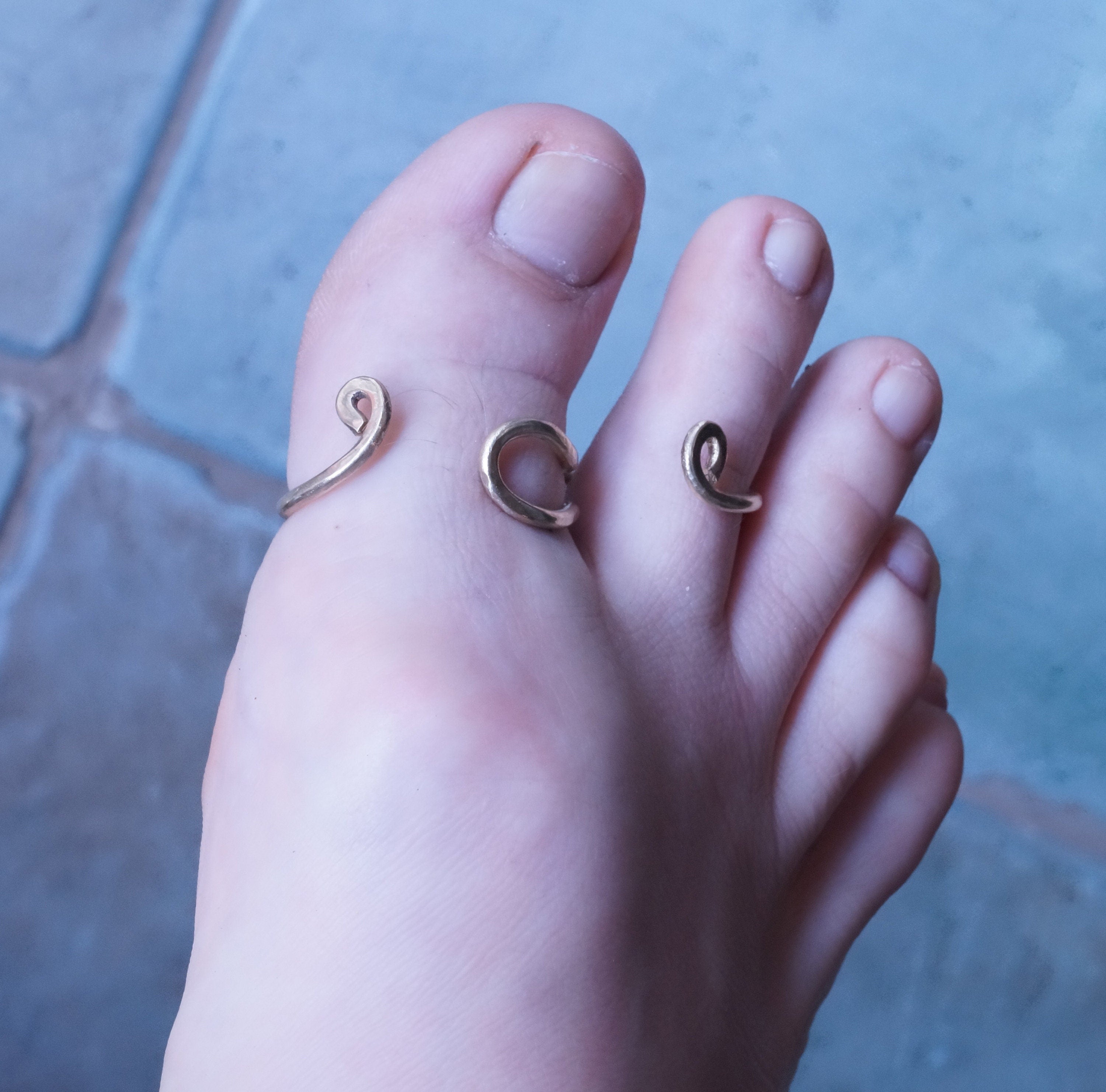 Handcrafted two ring toe splint designed for toe stabilization