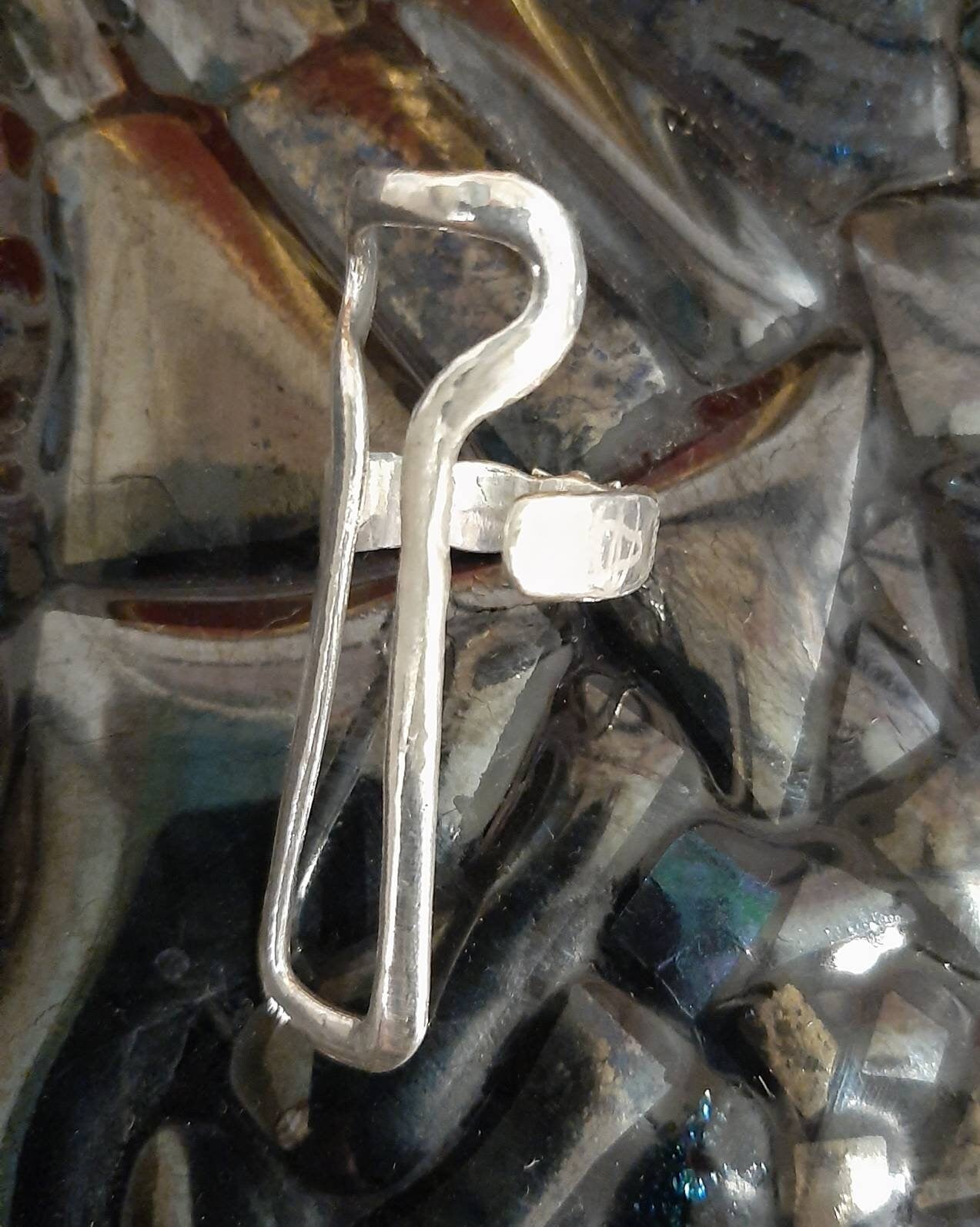 Adjustable  finger support ring designed for a custom fit and everyday wear