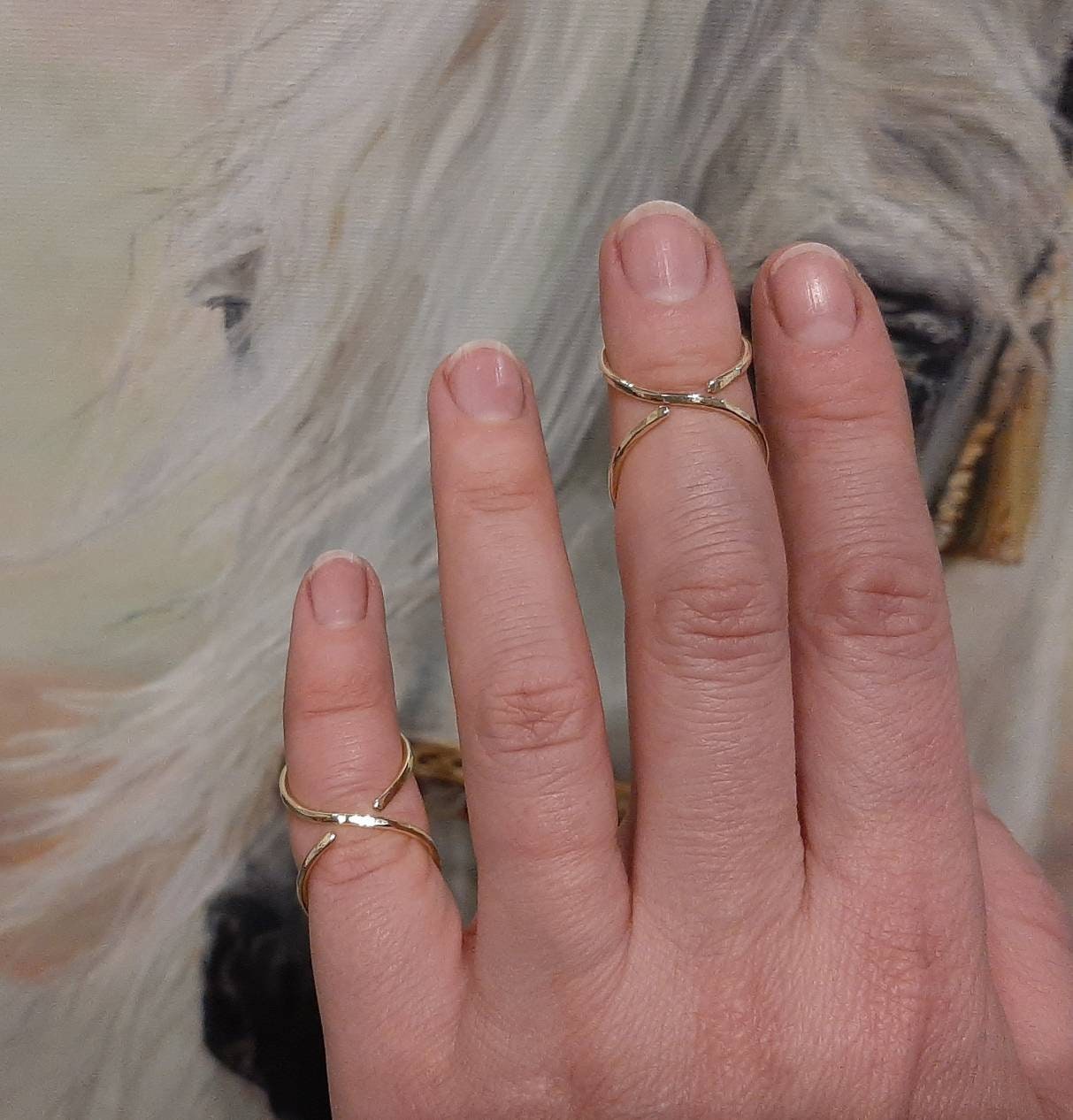 Adjustable hammered finger support ring designed for a secure and comfortable custom fit