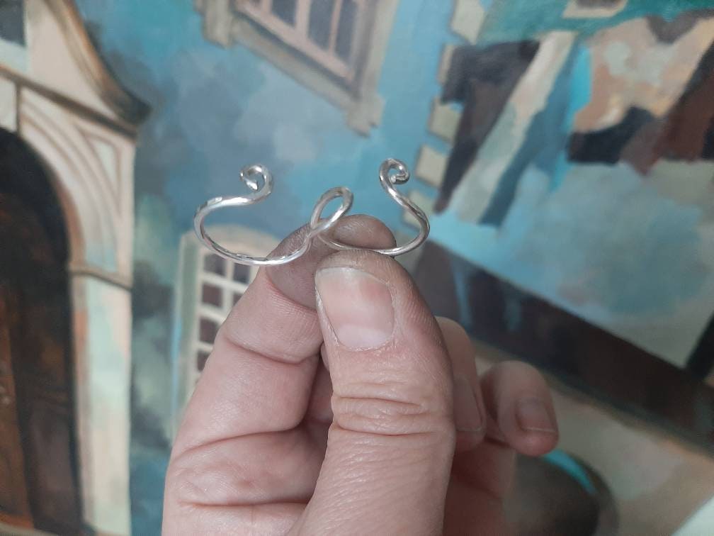 Adjustable sterling silver toe splint ring designed for a secure and comfortable fit