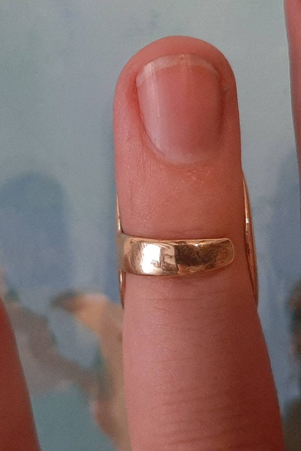 Close-up of a handmade silver finger support ring with elegant artisan craftsmanship
