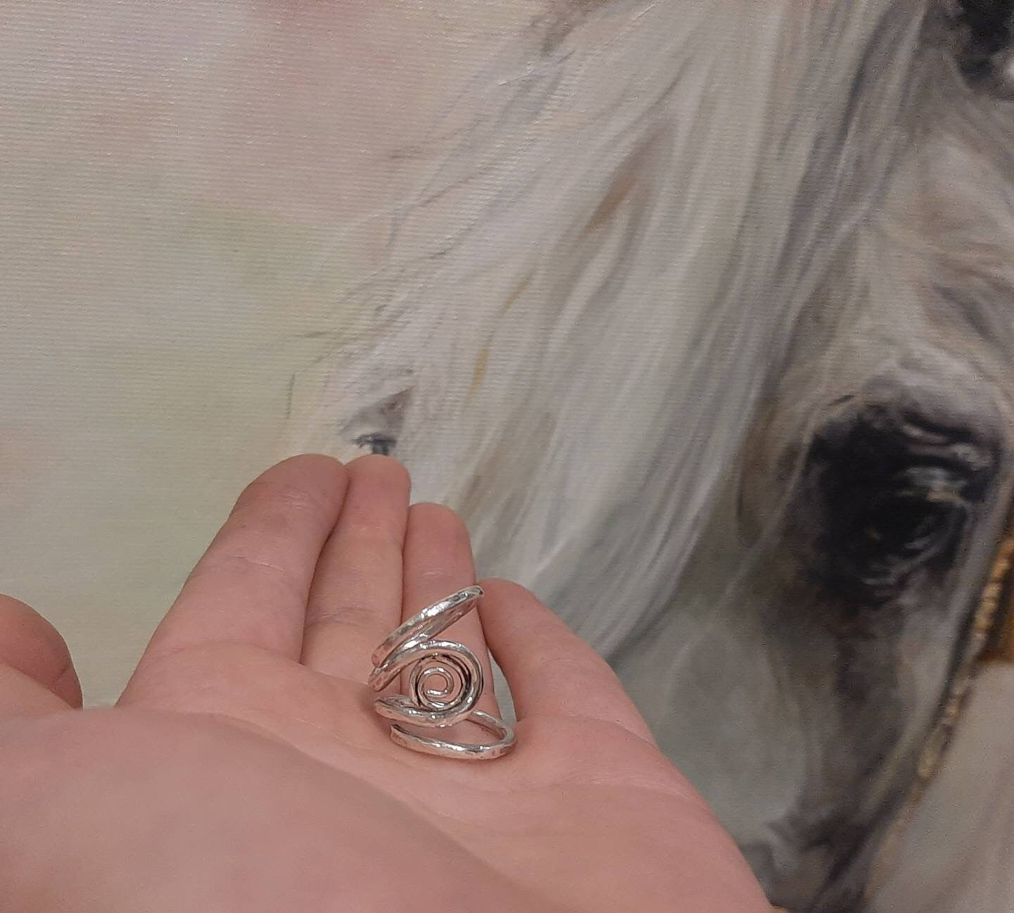 Close-up of a  finger splint ring with handcrafted details and smooth finish