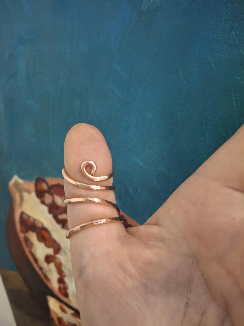Copper thumb splint ring worn on the hand for  joint support