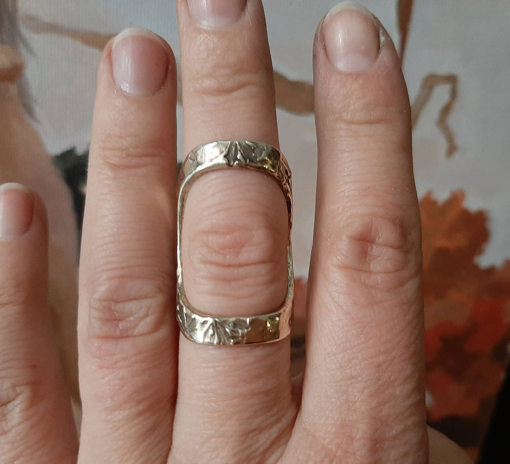 Sterling silver or bronze finger splint ring providing alignment and support for daily activities