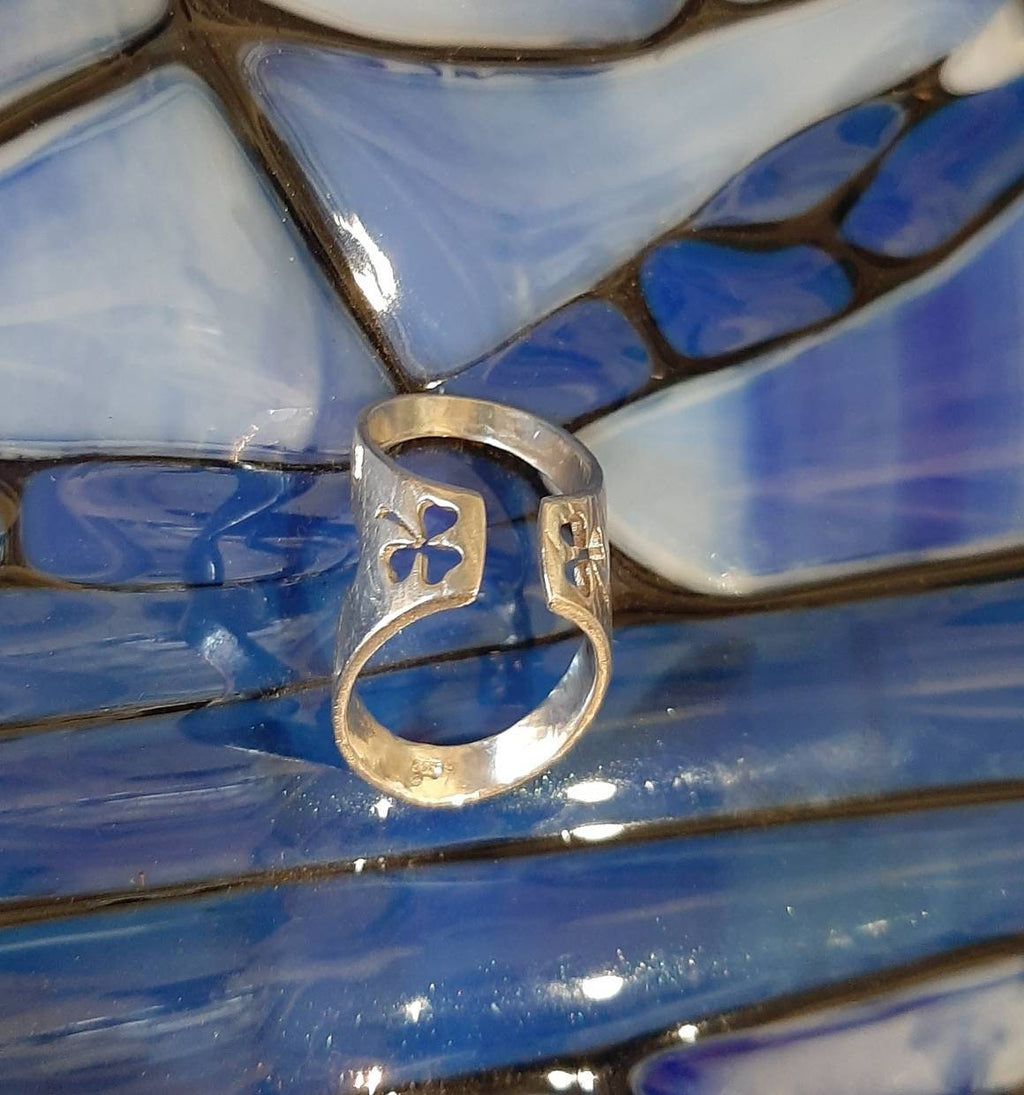 Close-up of an adjustable finger splint ring with a polished handcrafted finish