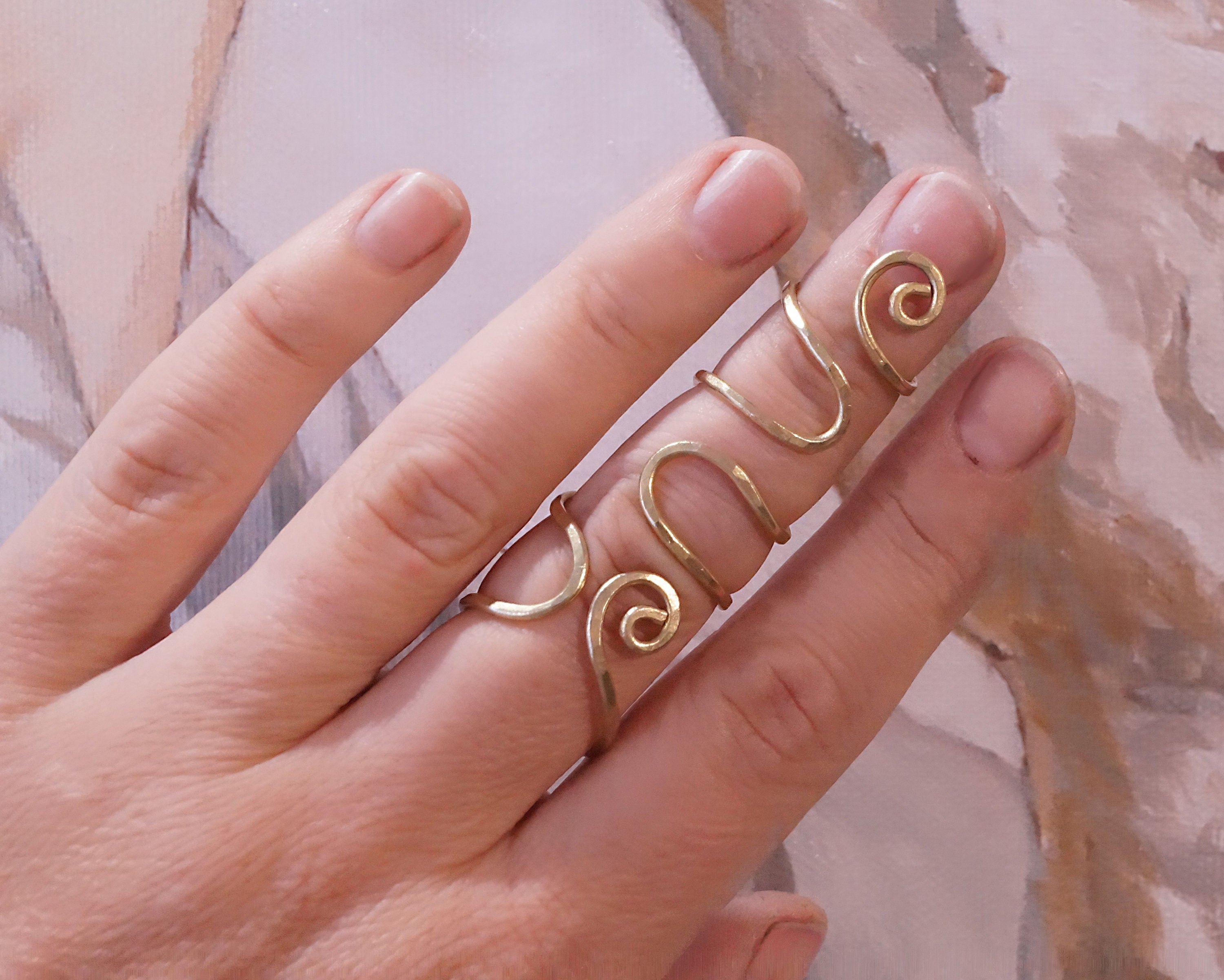 Adjustable brass finger splint ring worn for  support and finger joint 
