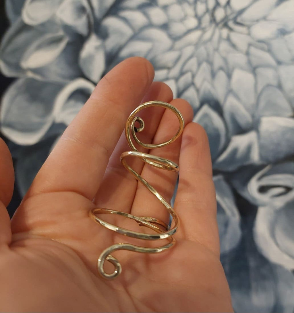 Handcrafted yellow brass thumb splint ring designed for everyday comfort and support
