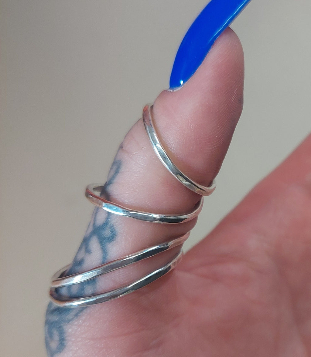 Side view of a sterling silver 925 thumb MCP splint ring providing support for hypermobile thumb joints