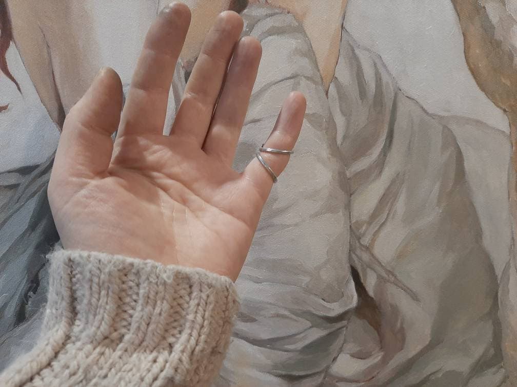 Close-up of  finger splint ring with handcrafted details and smooth finish