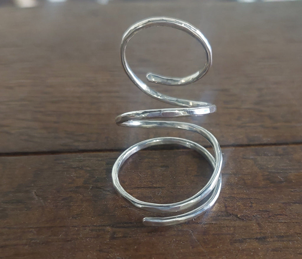 Sterling silver thumb MCP support ring designed to stabilize the thumb joint and reduce strain